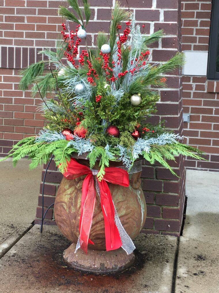 Winter planter with greens and ornaments